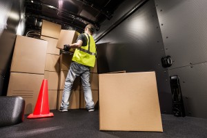 barnet same day courier stacking boxes inside his van